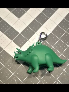 NWT BBW Non Roaring Green Triceratops Pocketbac Holder + 1 Free Hand Sanitizer